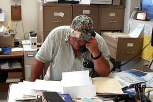 small business owner overwhelmed by bookkeeping